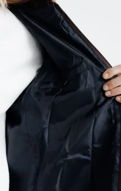 Manteau en fausse fourrure à capuche -
