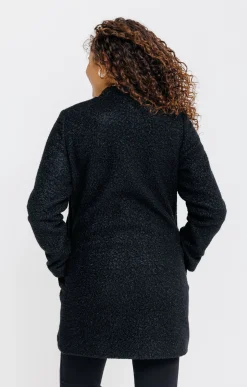 Manteau long en matière bouclette -