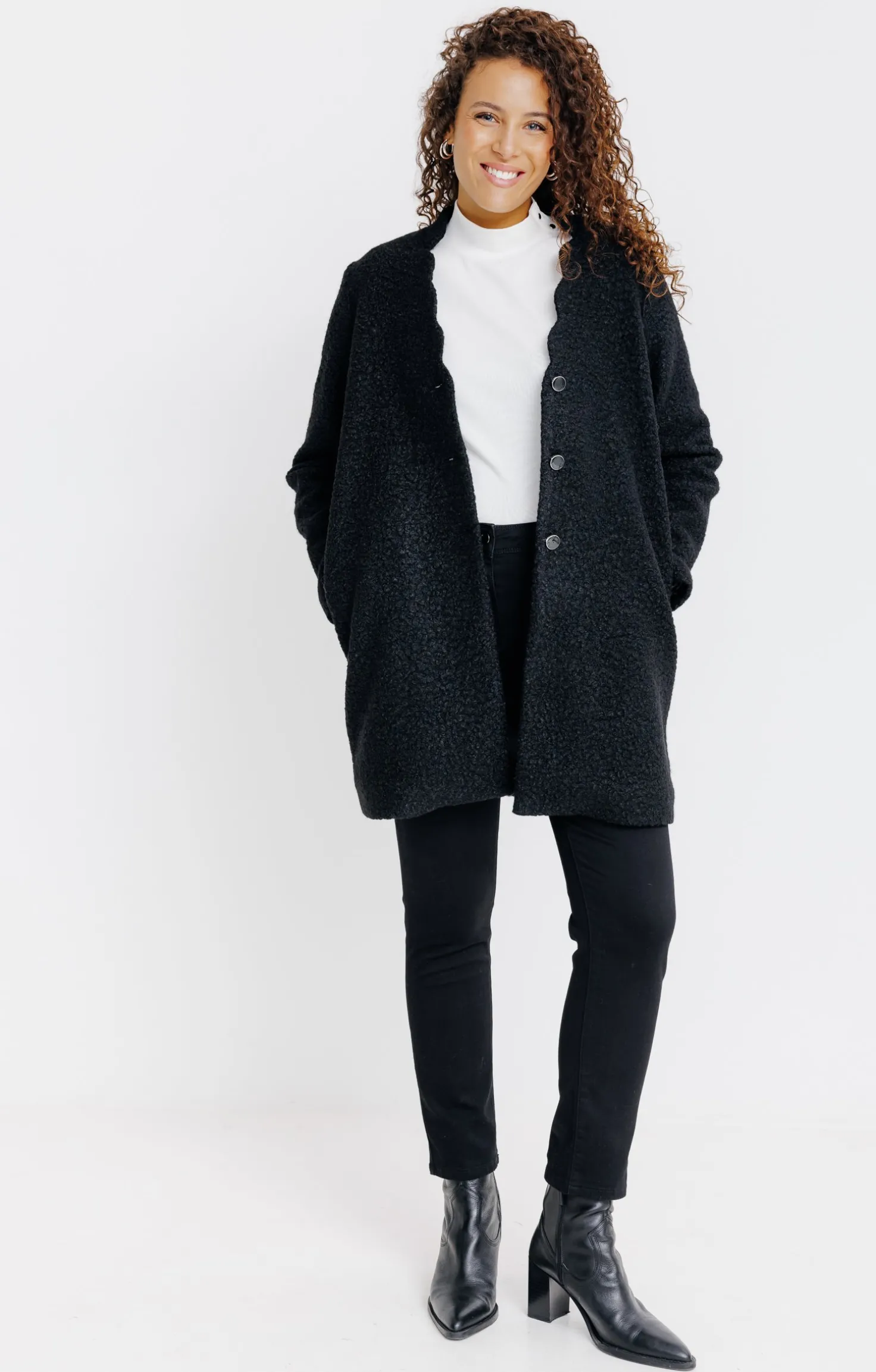 Manteau long en matière bouclette -
