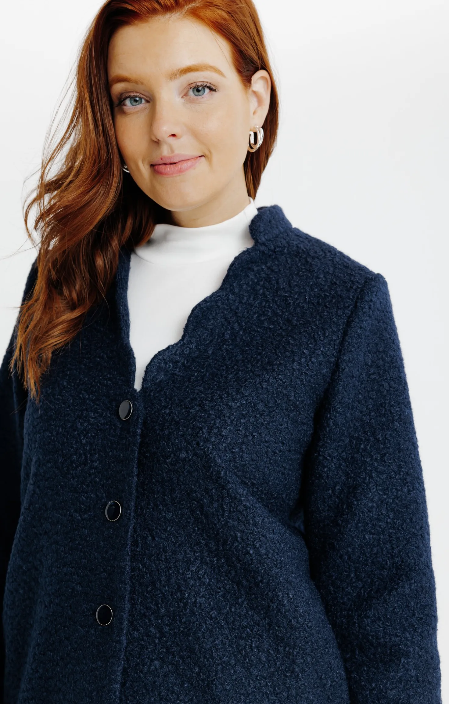 Manteau long en matière bouclette -