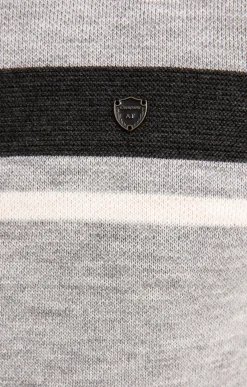 Pull col roulé rayé -