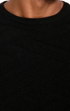Pull uni tricotage fantaisie -