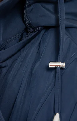 Trench avec double patte de boutonnage -